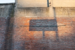 Monica_d_Church_Shadow-of-Snopes-Boxing-Sign-on-the-Trolley-Barn